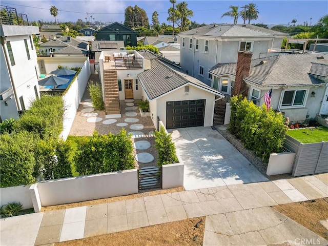 view of front of home with a garage