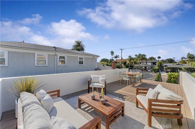 view of patio / terrace with outdoor lounge area and a deck