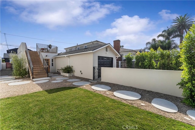 view of yard with a garage