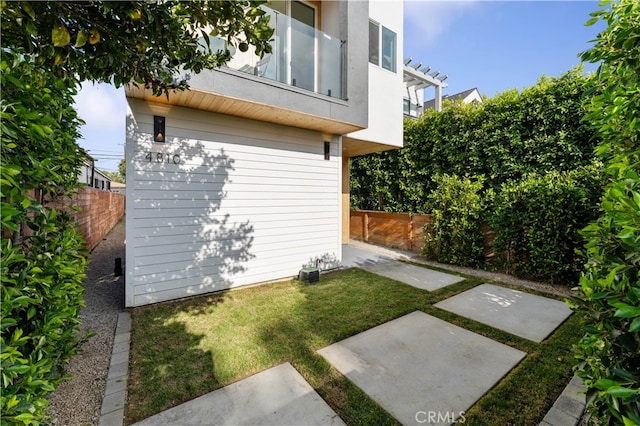 view of home's exterior with a patio