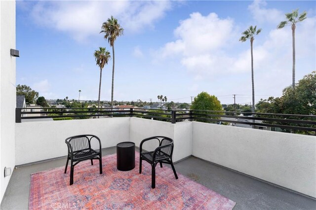 view of patio / terrace with a balcony