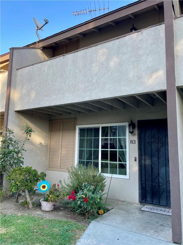 doorway to property featuring a balcony