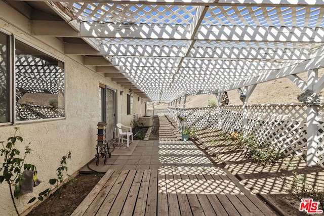 deck featuring a pergola