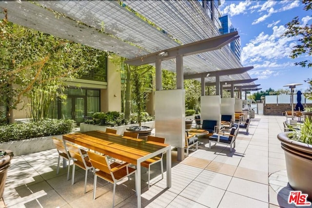 view of patio / terrace featuring a pergola