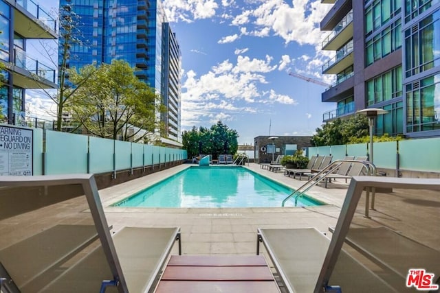 view of pool with a patio