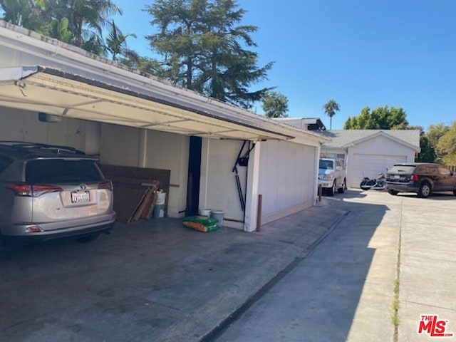 view of property exterior featuring a garage