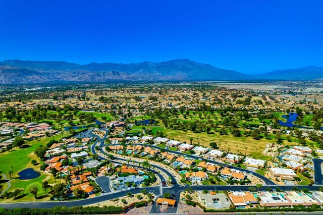 drone / aerial view featuring a mountain view