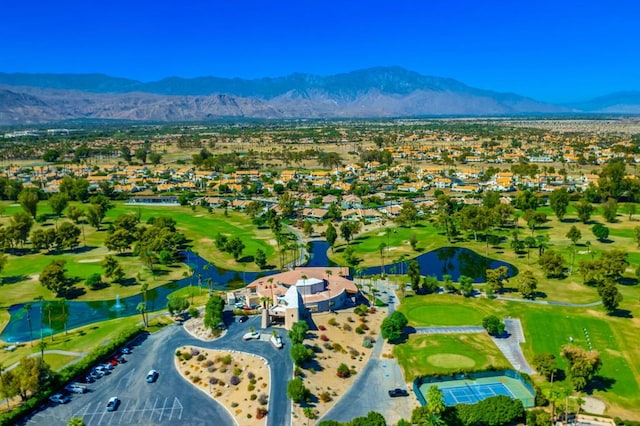 bird's eye view with a water and mountain view