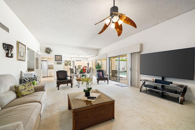 living room with light carpet, a textured ceiling, and ceiling fan