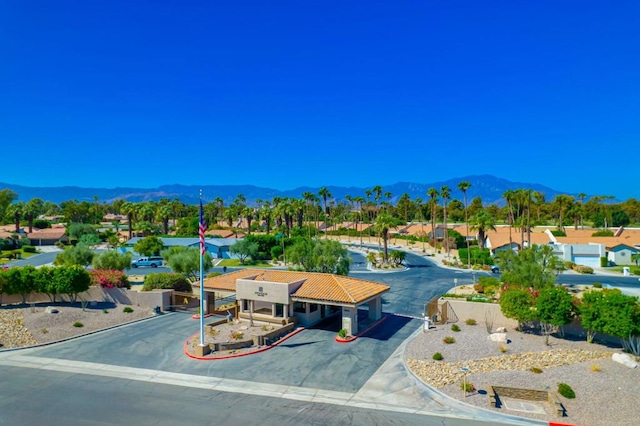 birds eye view of property with a mountain view