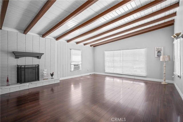 unfurnished living room with wooden ceiling, vaulted ceiling with beams, cooling unit, a fireplace, and hardwood / wood-style flooring