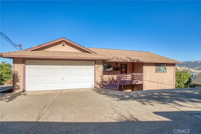 ranch-style house featuring a garage