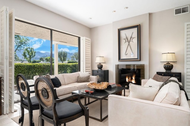 living room featuring a fireplace