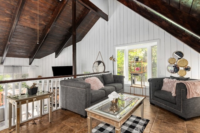 living room with dark tile patterned floors, lofted ceiling with beams, wood walls, and wooden ceiling