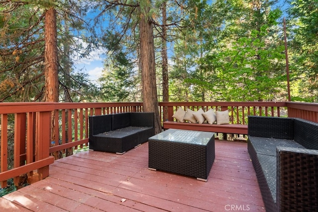 deck with an outdoor hangout area