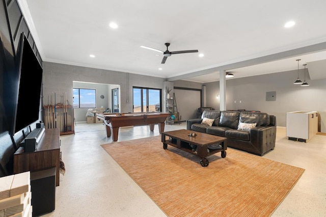 living room featuring ceiling fan, ornamental molding, and pool table