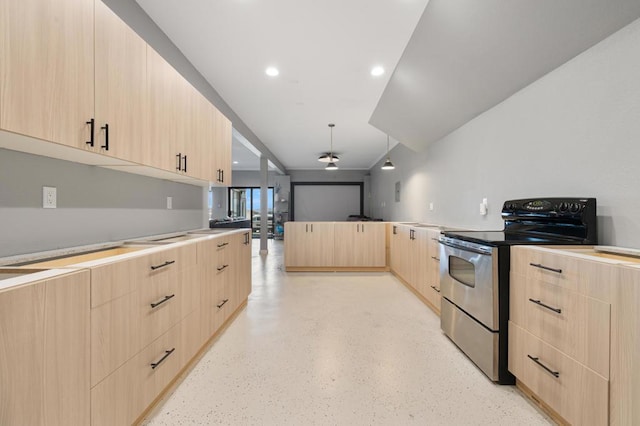 kitchen featuring light brown cabinetry and stainless steel range with electric cooktop