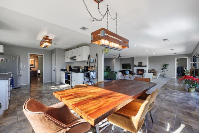 dining room with ceiling fan