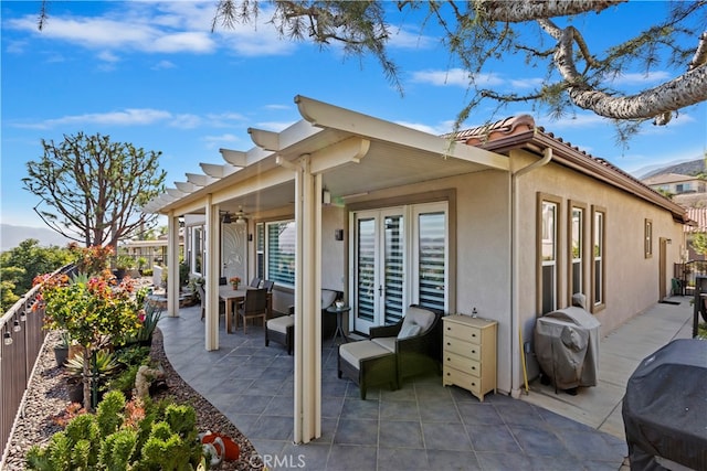 rear view of property with a patio area