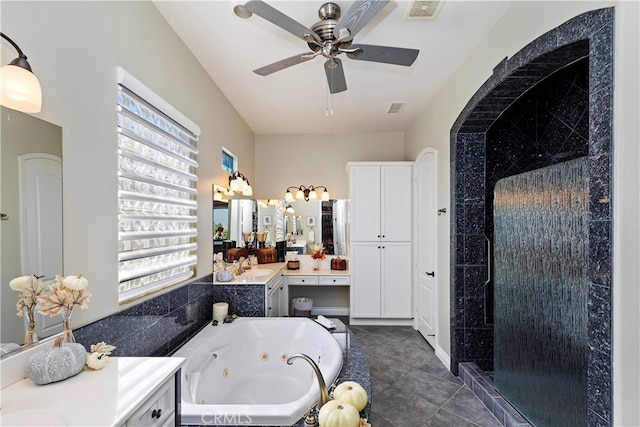 bathroom with tile patterned flooring, separate shower and tub, vanity, and ceiling fan