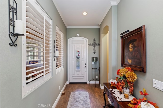 doorway featuring dark hardwood / wood-style floors and crown molding