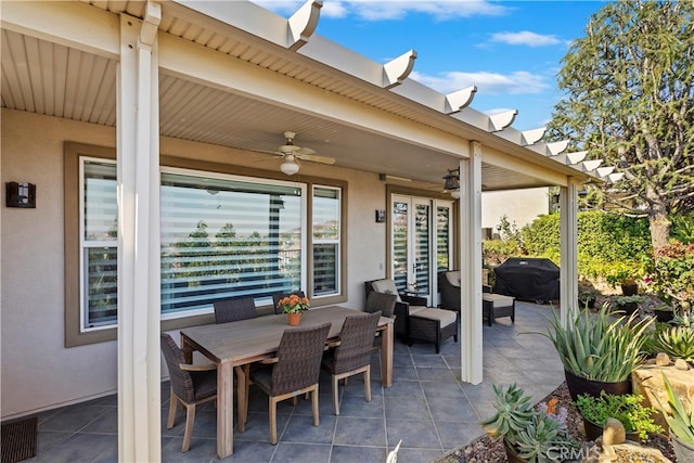 view of patio with ceiling fan, area for grilling, and an outdoor hangout area