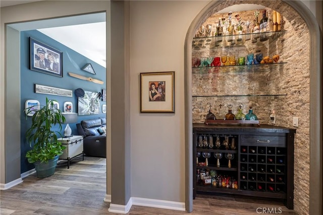 bar featuring hardwood / wood-style floors