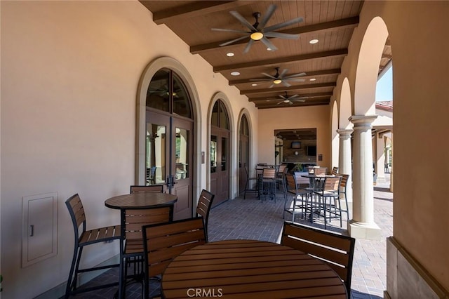 view of patio with ceiling fan