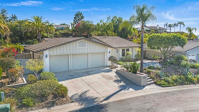 ranch-style house featuring a garage