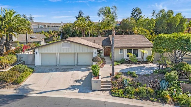 single story home featuring a garage