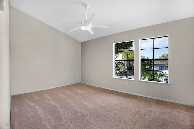 empty room with light carpet and ceiling fan