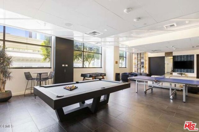 rec room with plenty of natural light and billiards