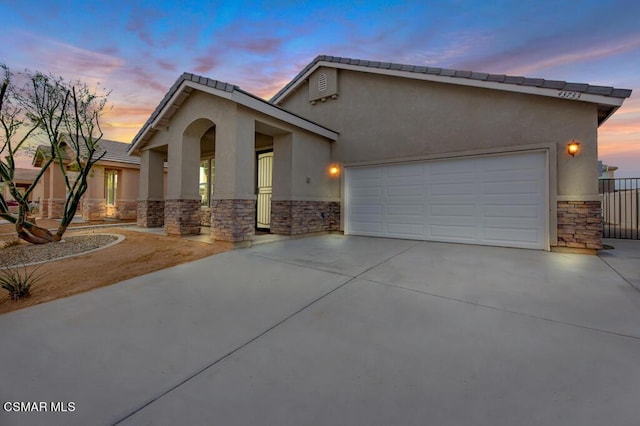 view of front of home with a garage