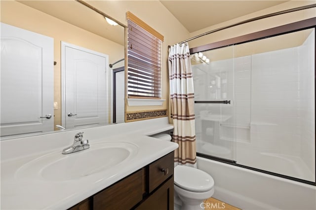 full bathroom featuring vanity, toilet, and shower / bathtub combination with curtain