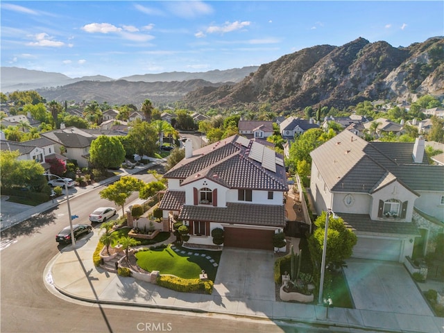 bird's eye view with a mountain view