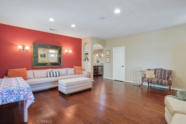 living room featuring dark hardwood / wood-style floors