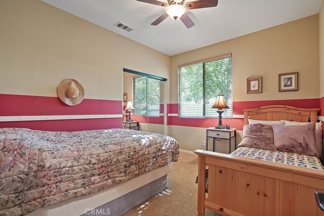 bedroom with carpet and ceiling fan