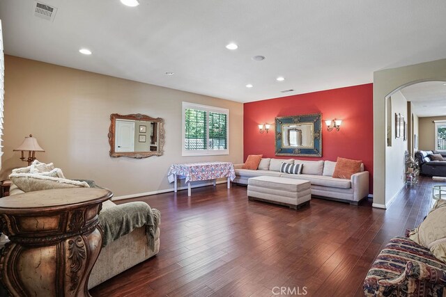 living room featuring dark hardwood / wood-style floors