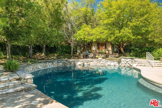 view of pool with a patio