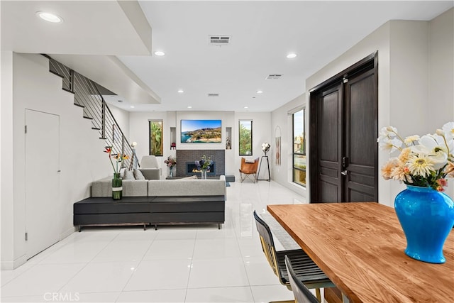 living room featuring light tile patterned floors