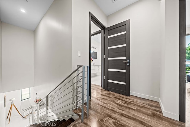 foyer entrance featuring wood-type flooring