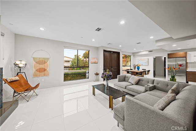 living room featuring light tile patterned floors