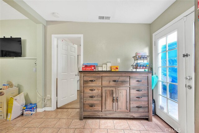 interior space with tile patterned floors