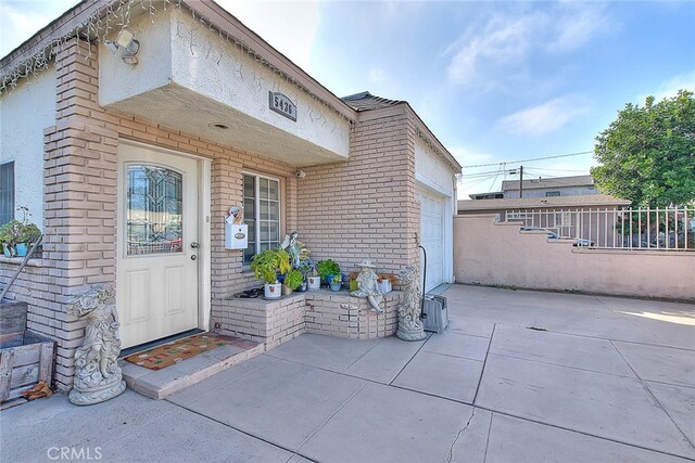 property entrance featuring a garage