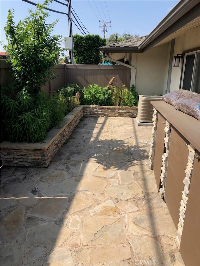 view of patio / terrace with central air condition unit