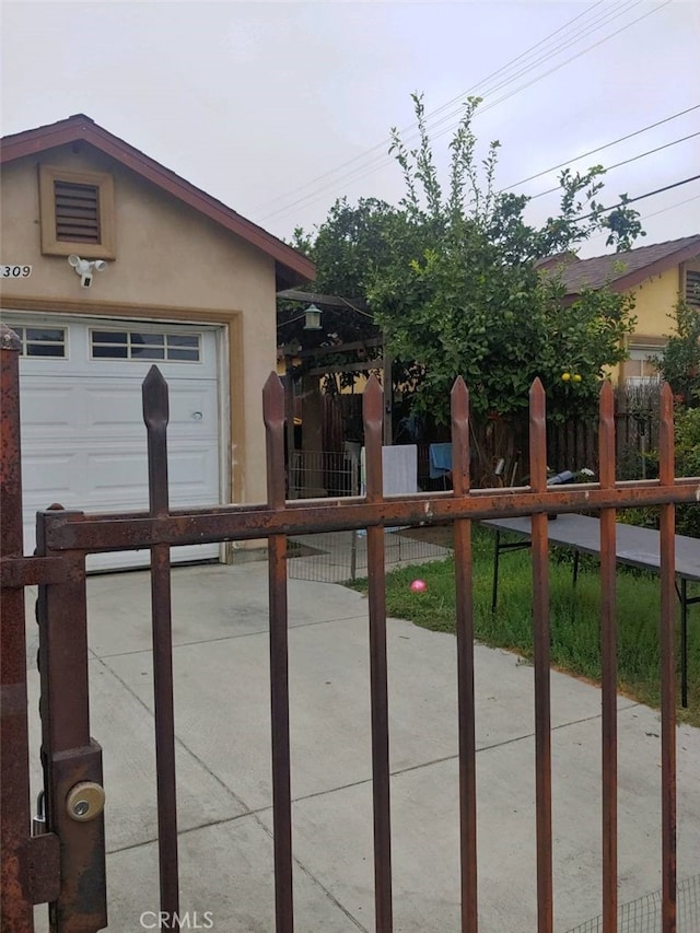 exterior space with a garage