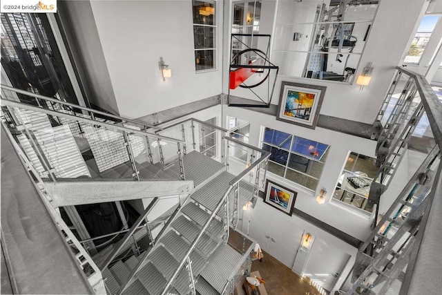 stairs with a towering ceiling