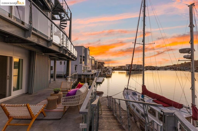 view of dock with a water view