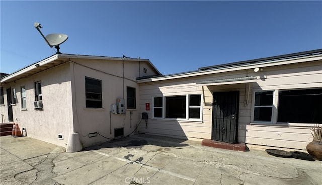 view of front of property with a patio