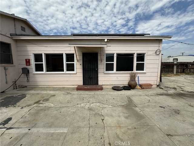 view of front of home featuring a patio area